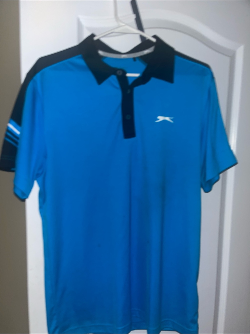 Puma Blue Polo with Black Collar and Shoulder Accents